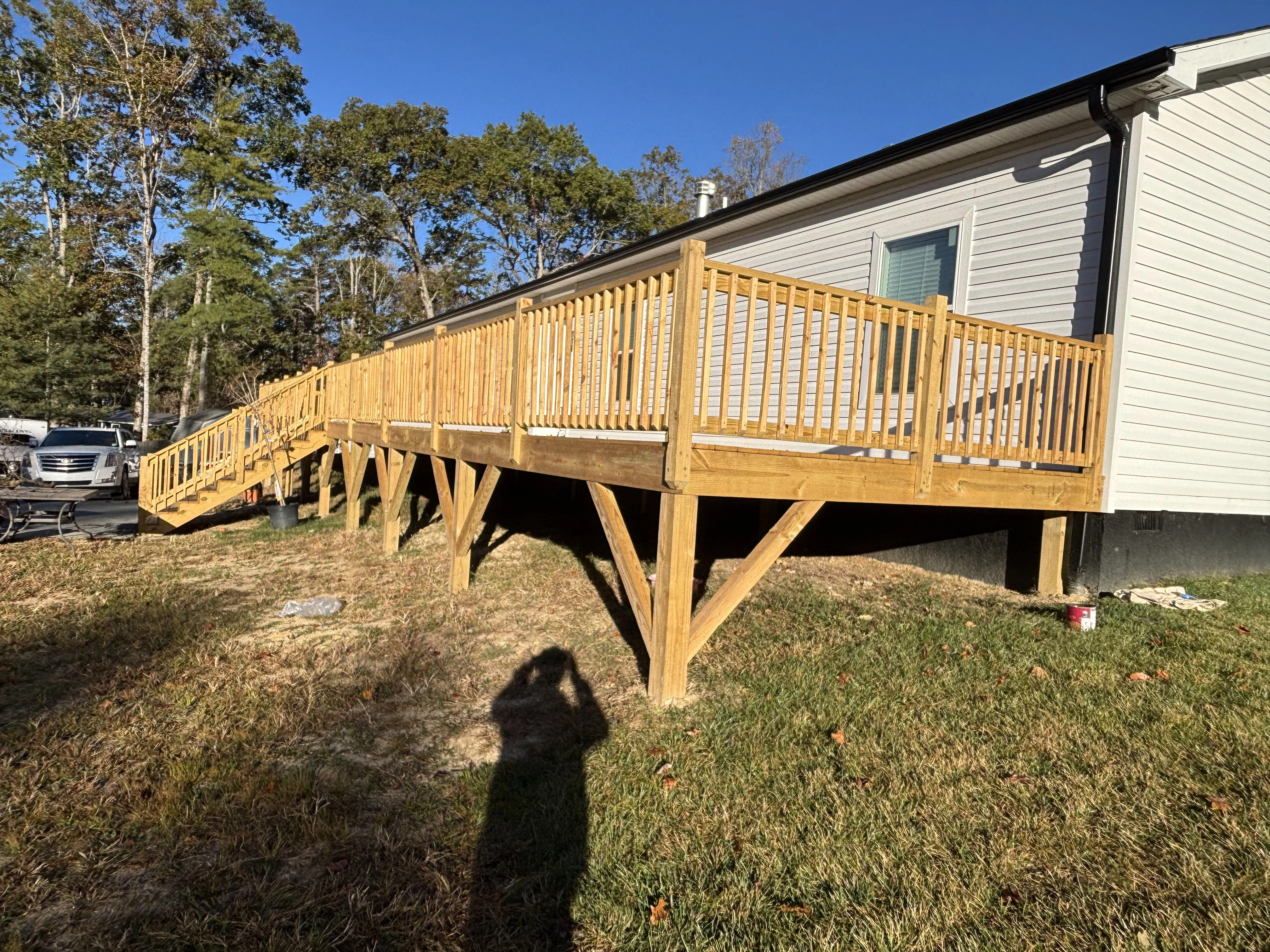 Custom backyard deck construction in Mills River by Civil & Home Solutions